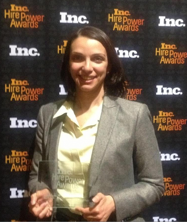 Aybike Crott, COO for Solectria Renewables, accepting award at the ceremony last night